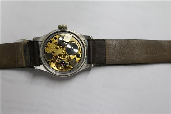 A mid 20th century stainless steel Longines mid size? manual wind wrist watch retailed by J.W. Benson,